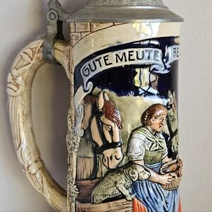 Vintage German  Musical Beer Stein This is a wind up music box also.